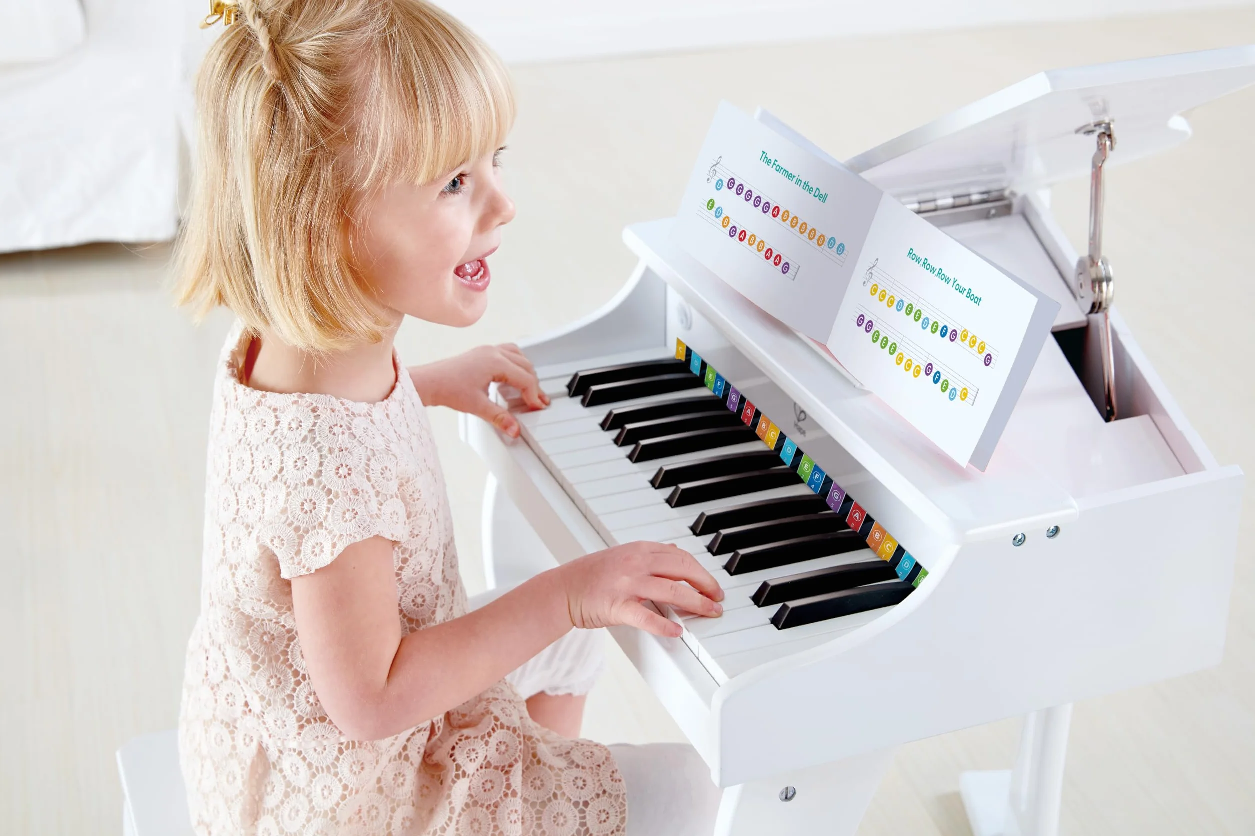 Hape Deluxe White Grand Piano, Thirty-Key Piano Toy with Stool, Electronic Keyboard Musical Toy Set for Kids 3 Years+