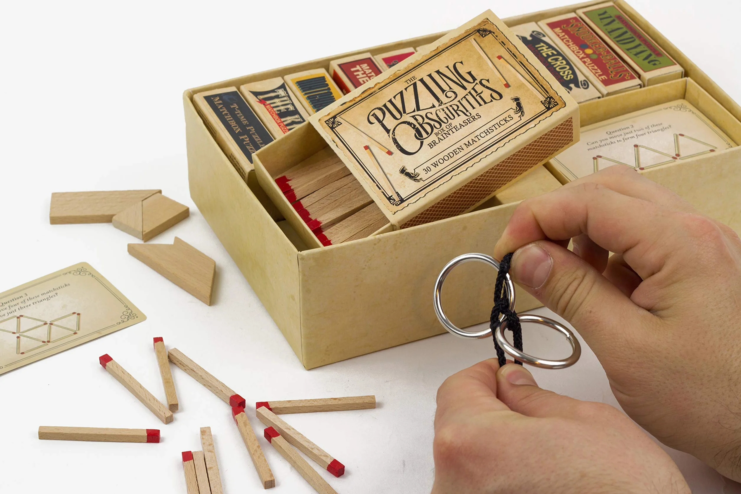 Professor Puzzle, Puzzling Obscurities Box of Brainteasers - 10 unikalnych puzzli z pudełkiem zapałek i 50 unikalnych wyzwań związanych z dokuczaniem mózgu