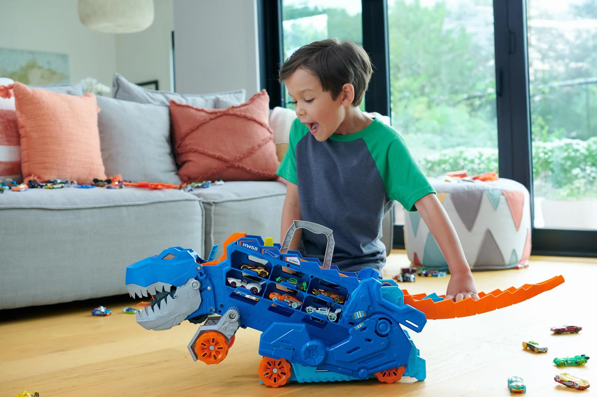 Hot Wheels City Toy Car Track Set, Ultimate T-Rex Transporter, Hauler Transforms into Stomping Dino with Race Track, From Netflix Series “Let’s Race”, HNG50