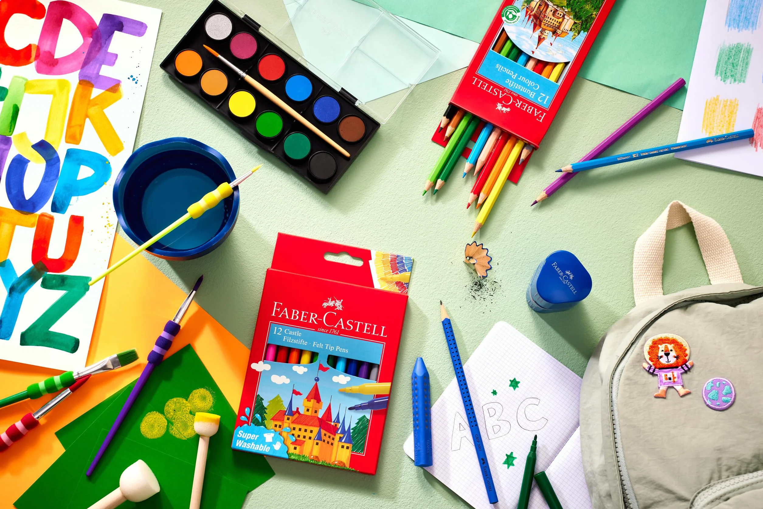 Faber-Castell 125018 - Pudełko z akwarelami 12 kolorów, w zestawie z pędzlem, pudełko do kolorowania dla szkoły i czasu wolnego