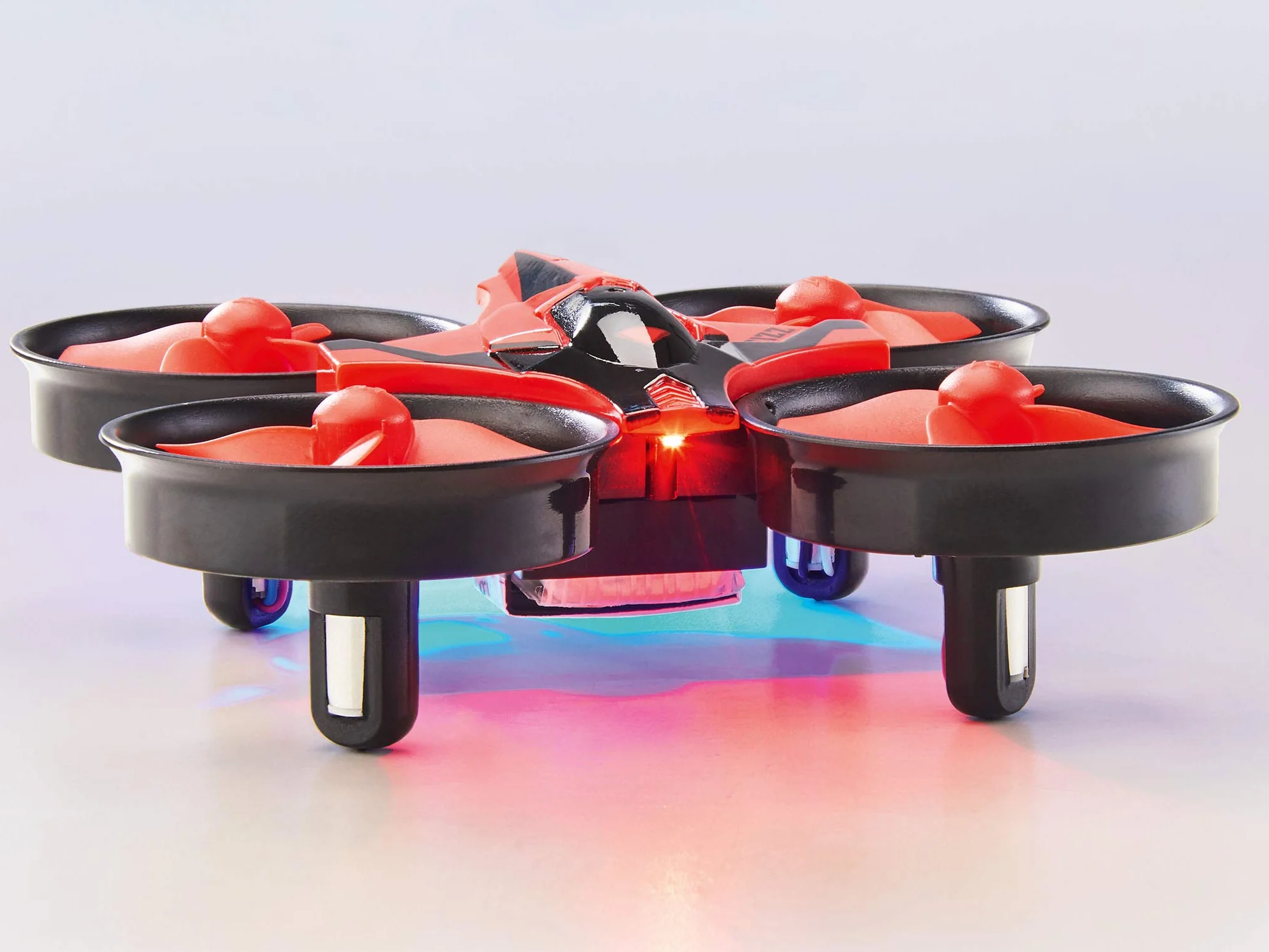 Revell Control 23823 Pilot zdalnego sterowania Mini Quadcopter "Fizz" z precyzyjnym sterowaniem 2,4 GHz, 3 prędkości, tryb klapki, światła LED, tryb bezgłowy, łatwy do latania, długość 8,5 cm,