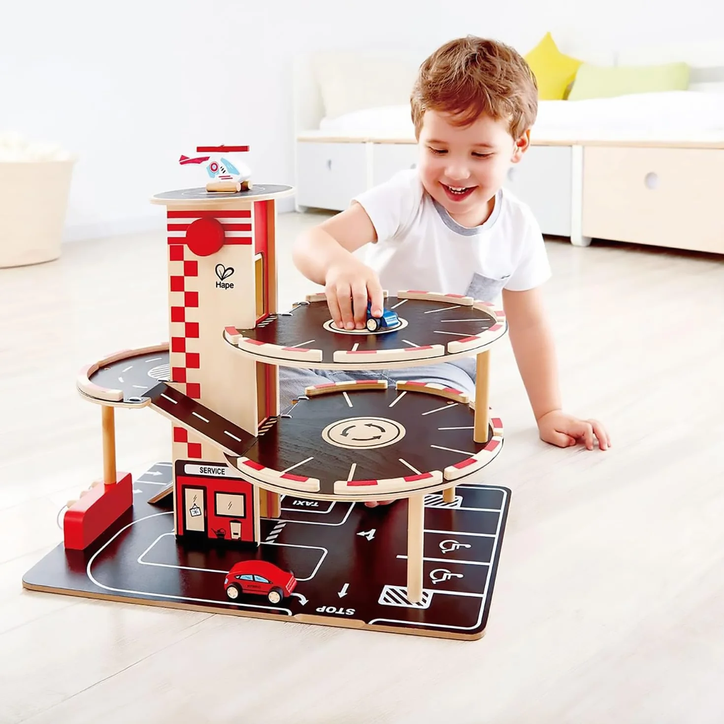 Sustainable Wood Toy Car, Toys For Kids, Hape “Park And Go” Garage Set With 4 Levels, 1 Lift, 2 Toy Cars, 1 Toy Helicopter. 3 years +